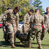 soliders carrying soldier