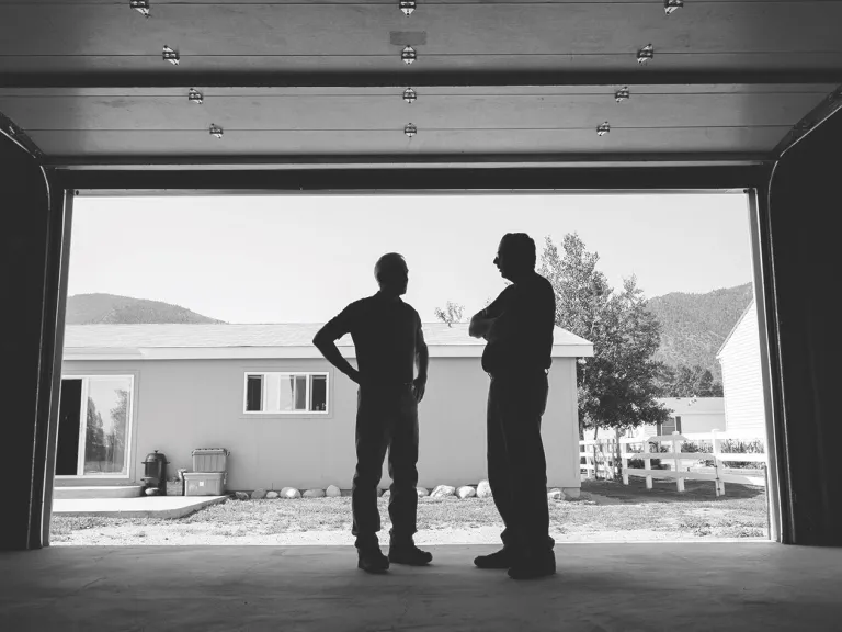 black and white guys talking