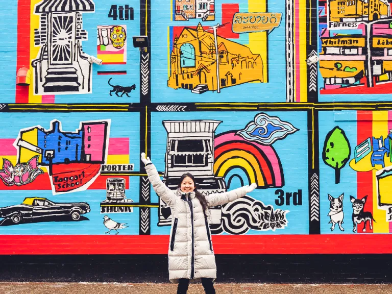 Mira Kim in front of banner