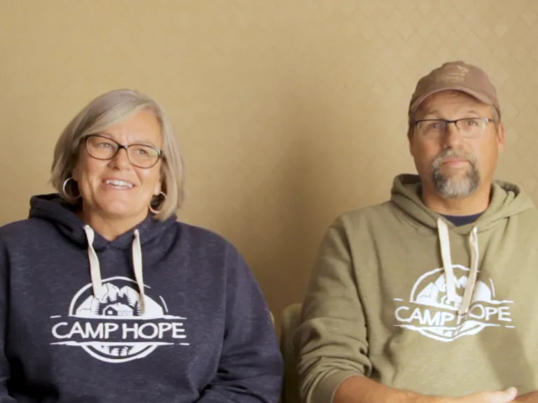 Missionaries Carrie and Louis Nelson sitting down for an interview