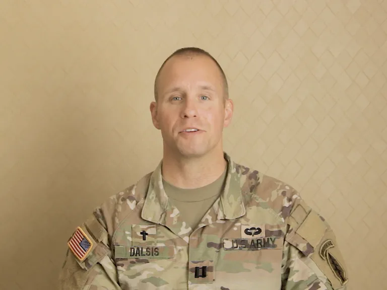 Chaplain Travis Dalsis being interviewed