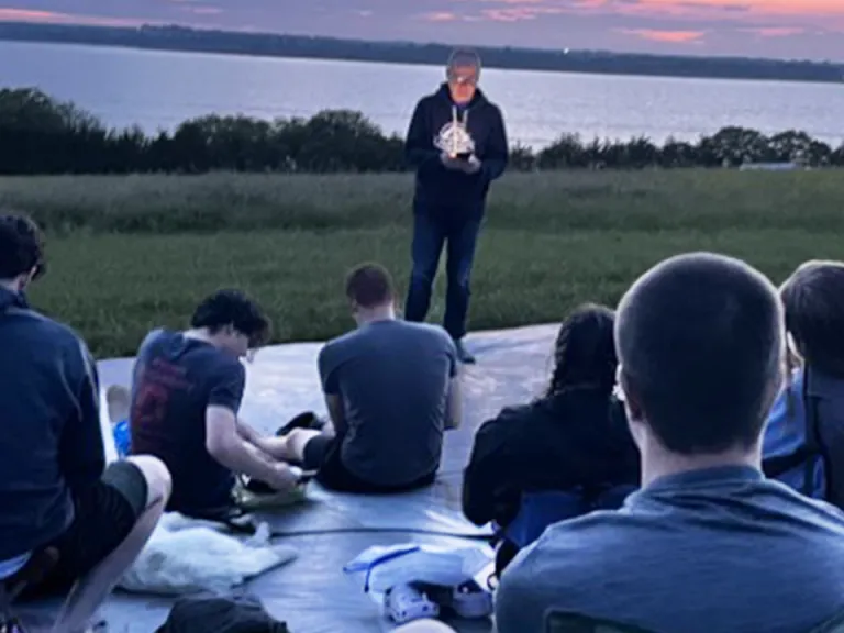 Jerry talking with campers