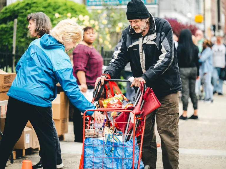 homeless man getting food