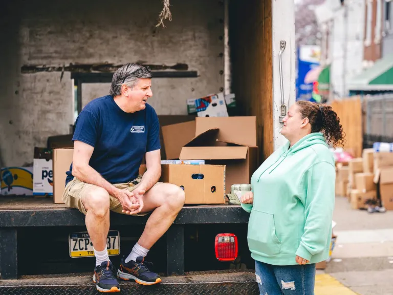 Missionary talking to lady