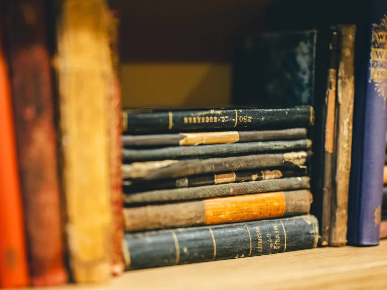 Old books on bookshelf