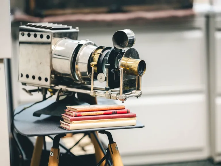 old film camera with old books
