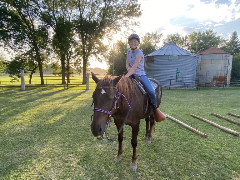 girl riding on a horse