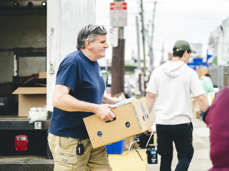 Carrying a box of food