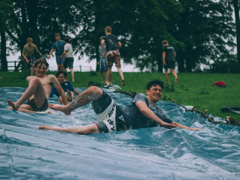 young adults on slide