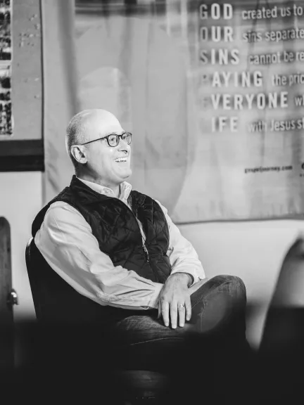 Jerry smiling while interviewing