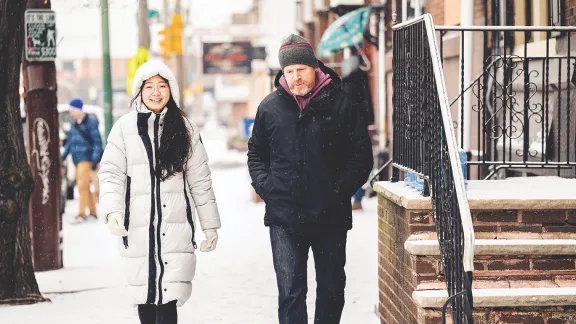 Mira Kim and David walking down philly