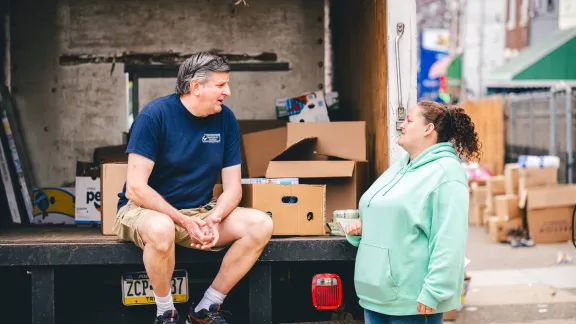 Missionary talking to lady