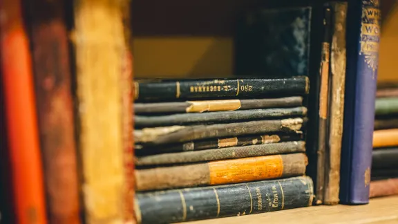 Old books on bookshelf