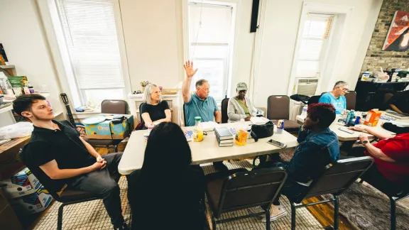 joe having a bible study with a group