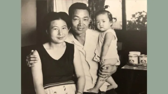 John kim young with wife and child