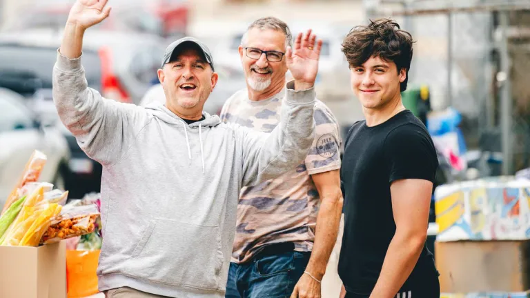3 guys smiling